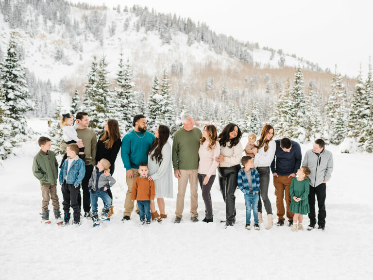 Full Extended Family photography session poses at snowy Silver Lake up Big Cottonwood Canyon in Utah Family Photograph